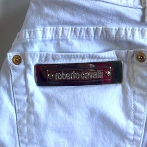 Roberto Cavalli white jeans w/ gold & rhinestone pocket label & snakeskin waist